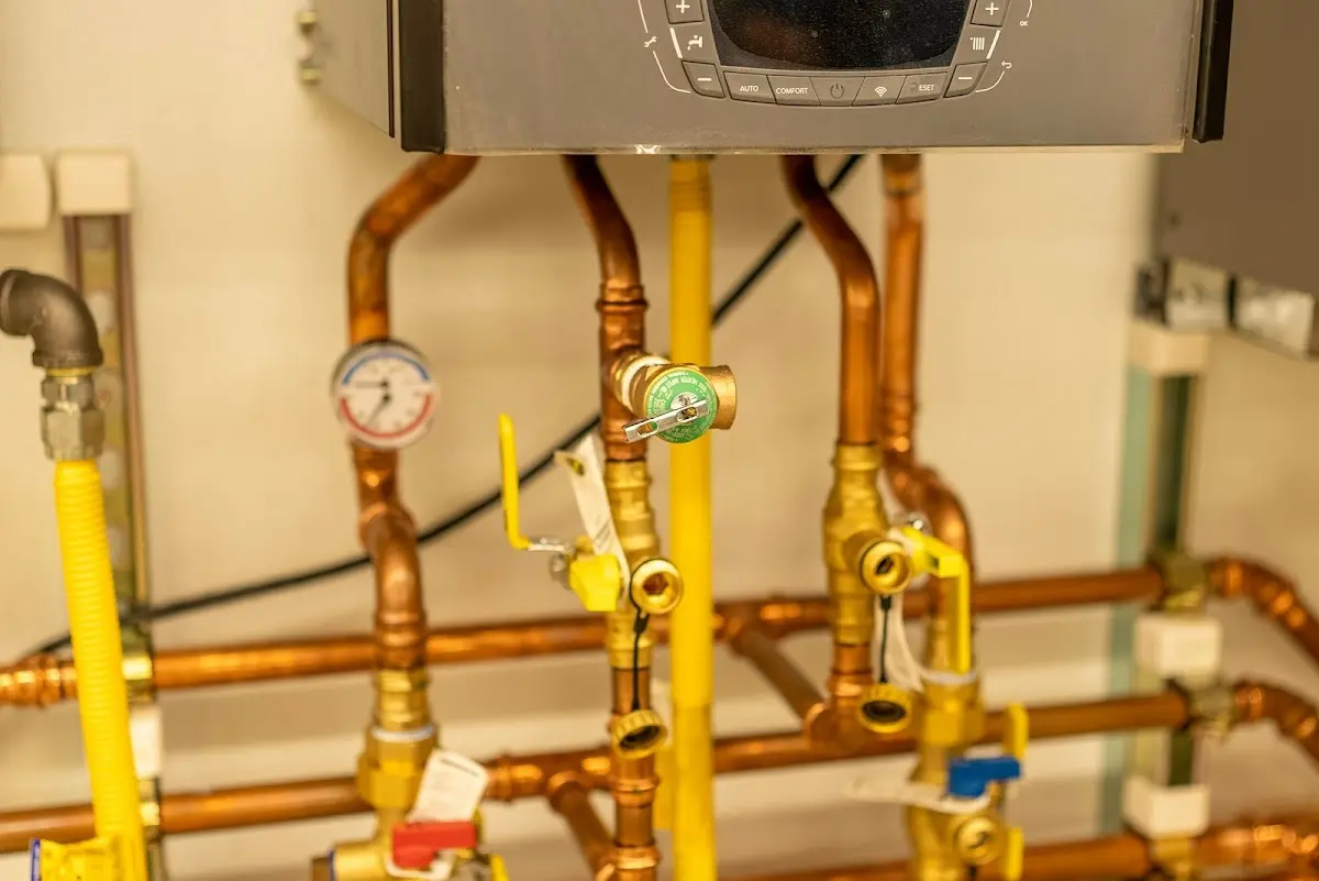 Licensed technician providing Backflow Prevention for a homeowner in Sand Springs